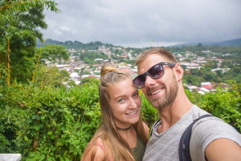 A couple take a selfie on the Ruta de Las Flores, El Salvador