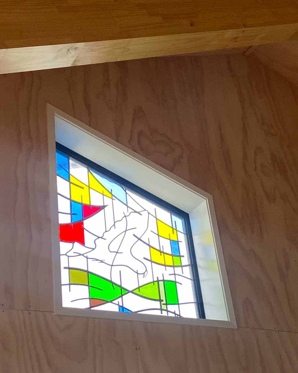 One of the stained glass windows at the Pouakai Hut