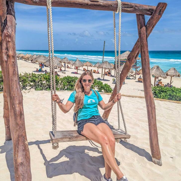 Bailey on a swing on Playa Delfines, Cancun, Mexico