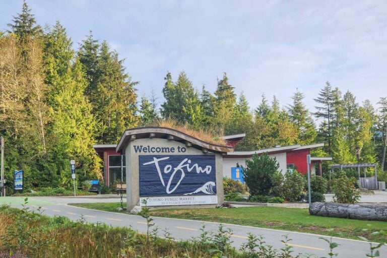 the welcome to Tofino road sign