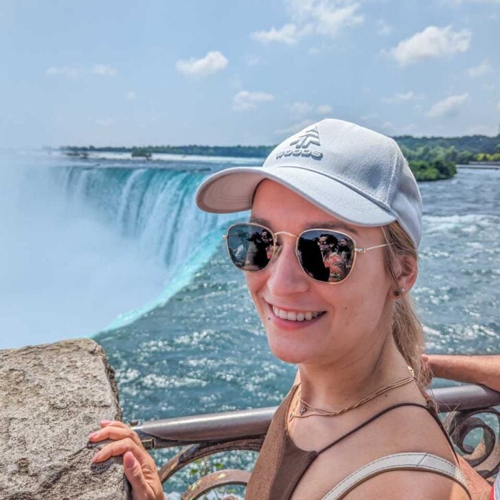 Bailey smiles at the Camera at a viewpoint of Niagara Falls, Canada