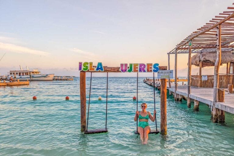 Bailey relaxes on a swing on Isla Mujeres while the catamaran comes to pick us up