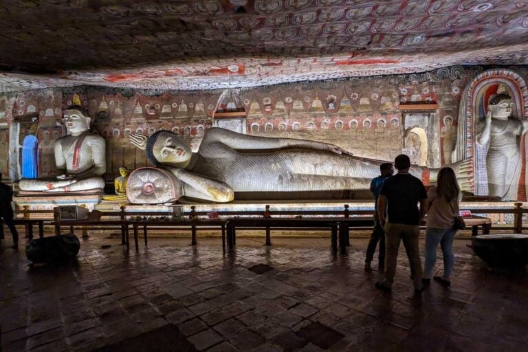 A giant sleeping stone Buddha statue in Dambulla Cave Temple Sri Lanka