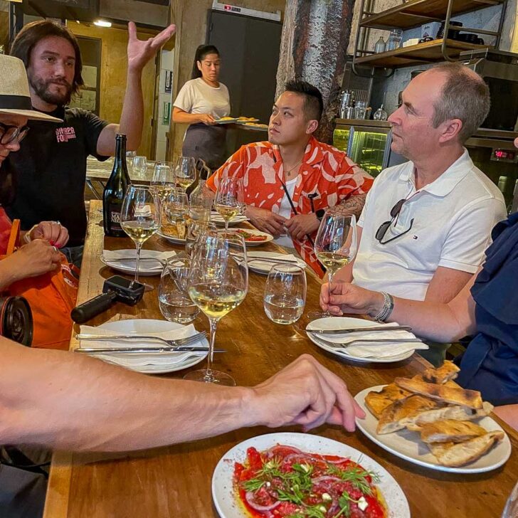 People enjoy a meal on a sherpa food tour in Buenos Aires Argentina