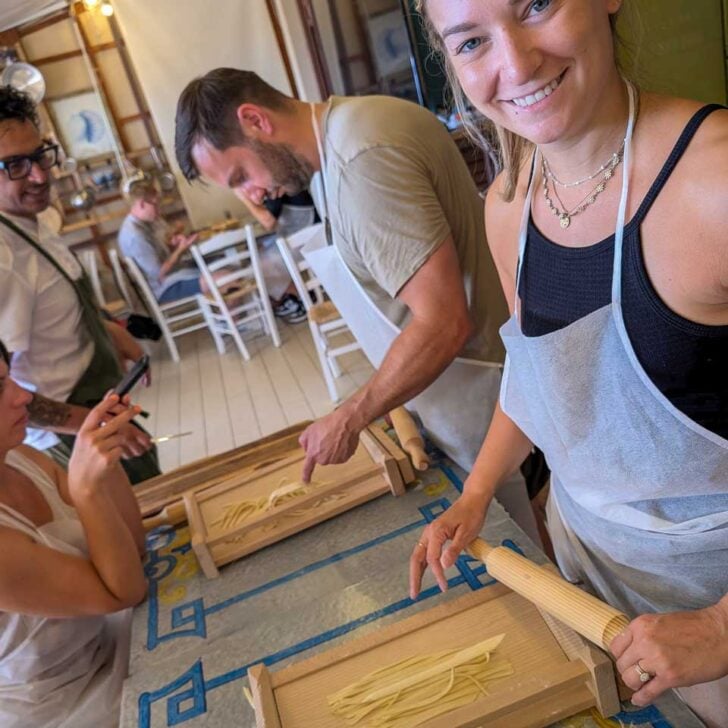 Bailey makes noodles during a cooking class in Taormina Italy