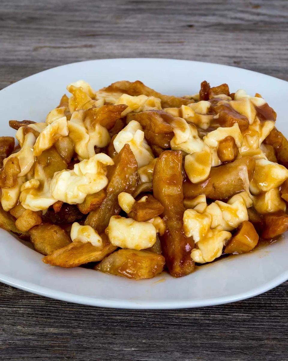 Poutine-eaten-on-a-food-tour-in-Banff Canada