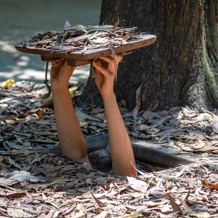 A person in the Cu Chi Tunnels on a tour from Saigon Ho Chi Minh Vietnam