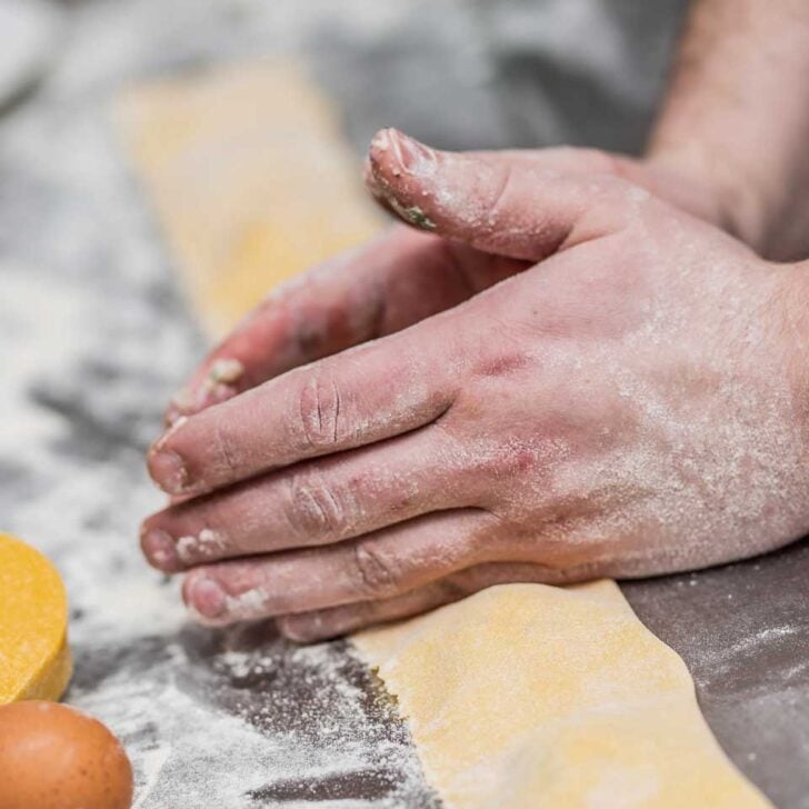A person making pasta during a cooking class in Florence Italy