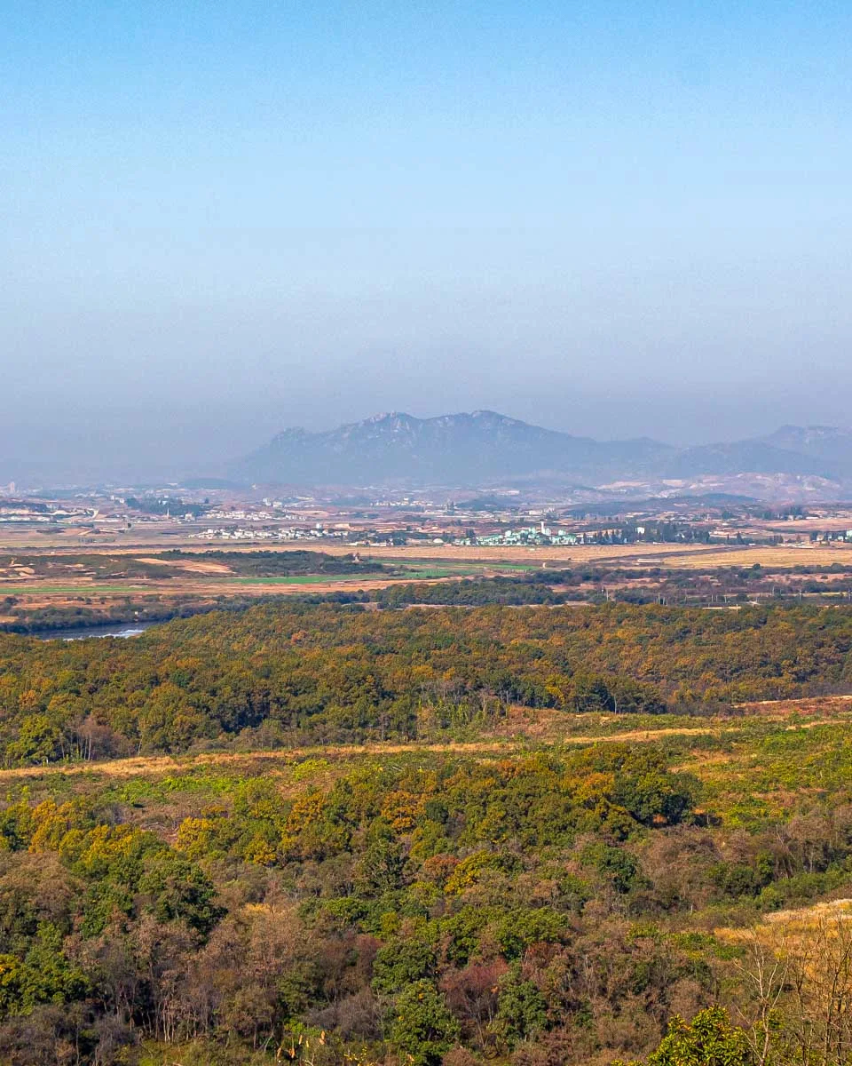 Looking into North Korea from the Dora Observatory at the DMZ on a tour from Seoul South Korea