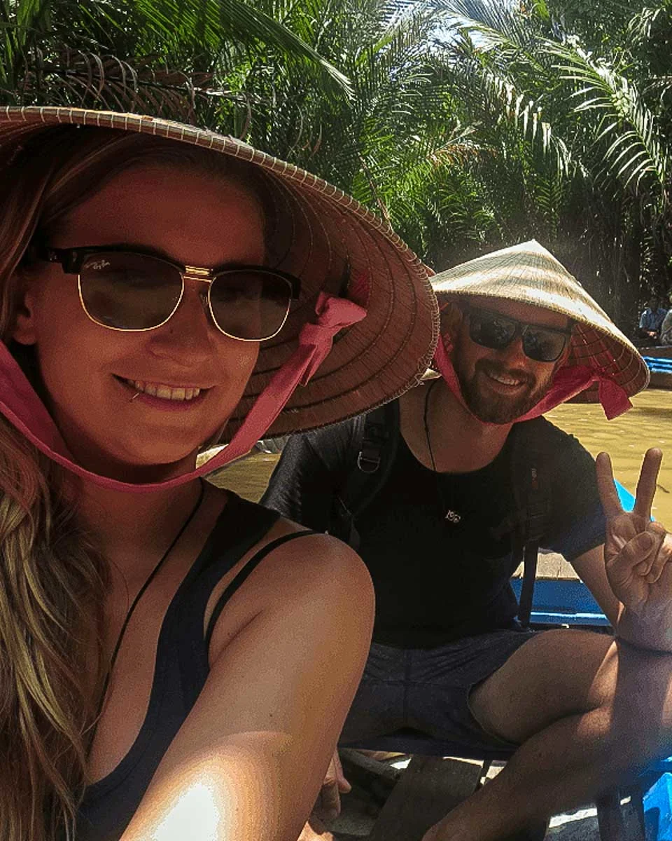 Dan-and-Bailey-take-a-selfie-on-the-mekong-delta on a tour from Ho Chi Minh Vietnam