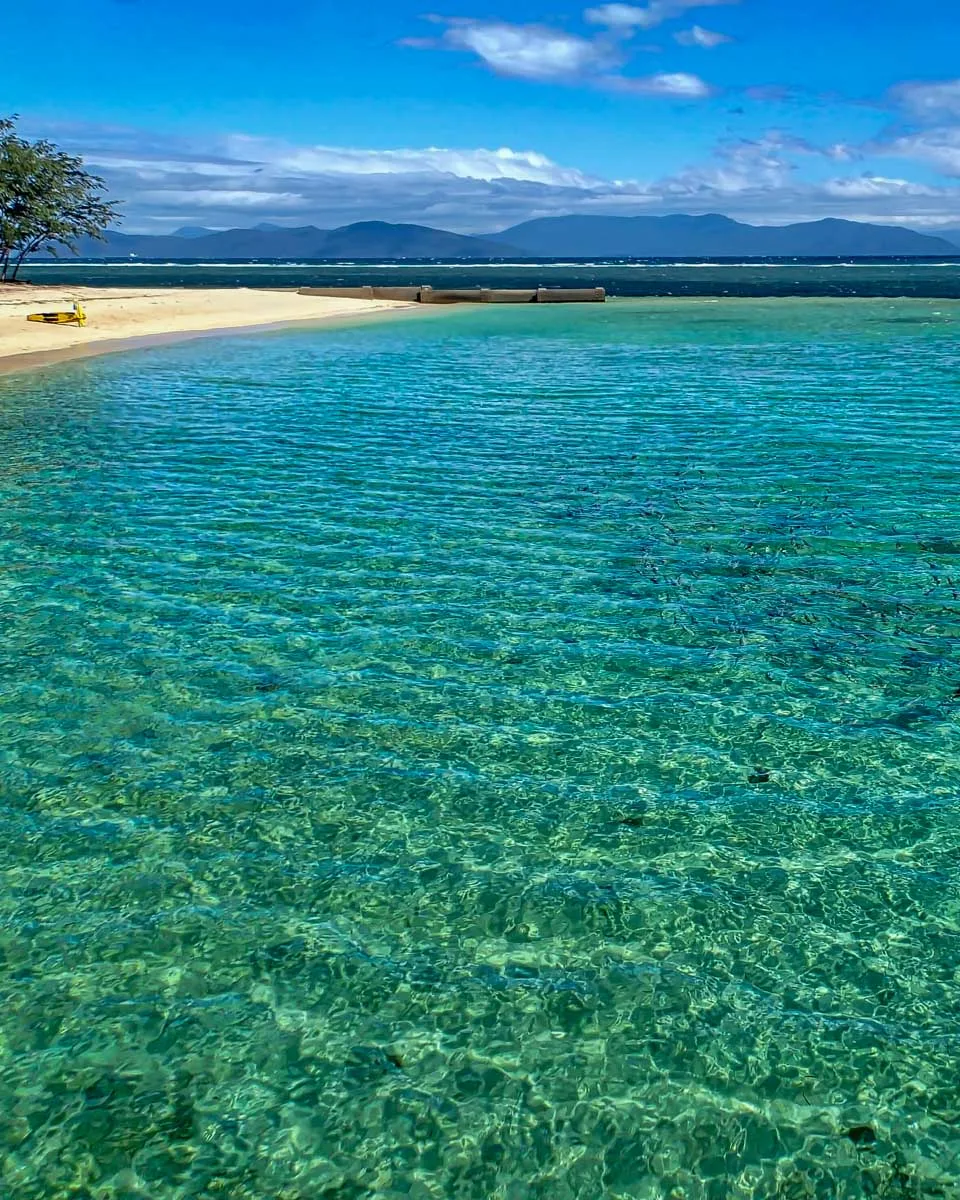 Green Island seen from shore on a tour from Cairns Australia