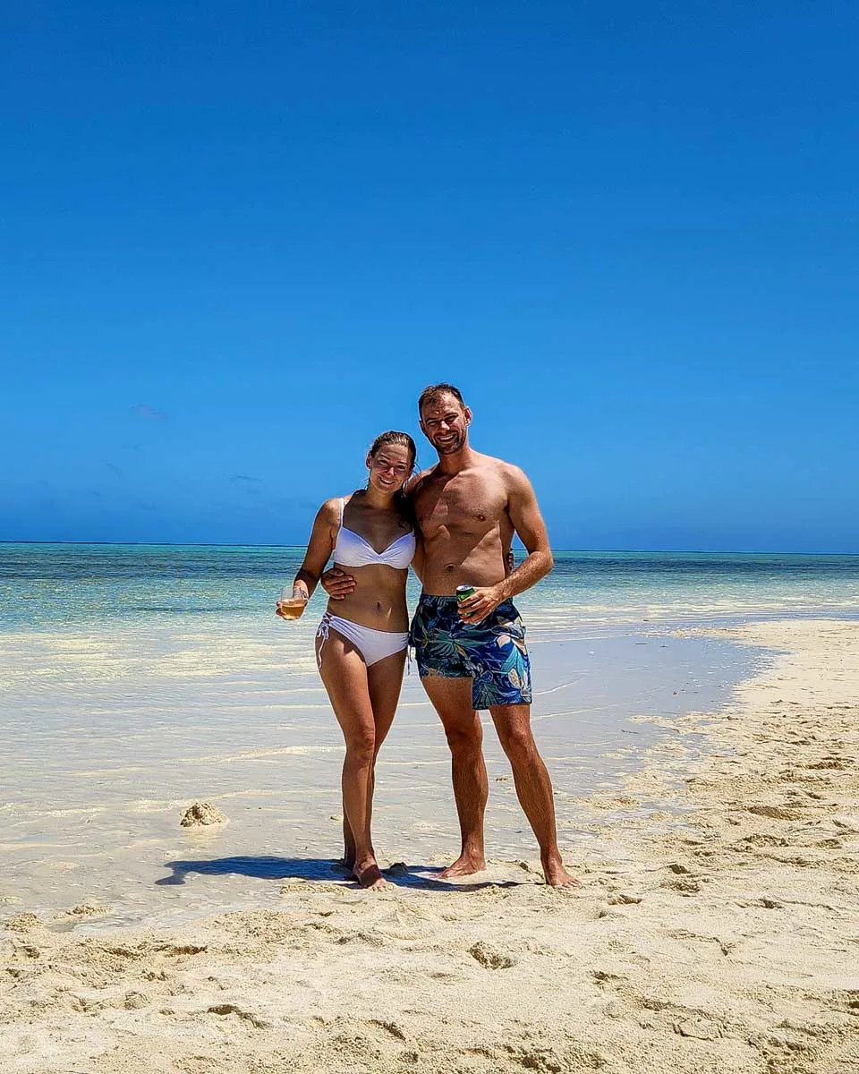 Daniel-and-Bailey-stand-on-a beach in Anguilla ona tour from Saint Maarten
