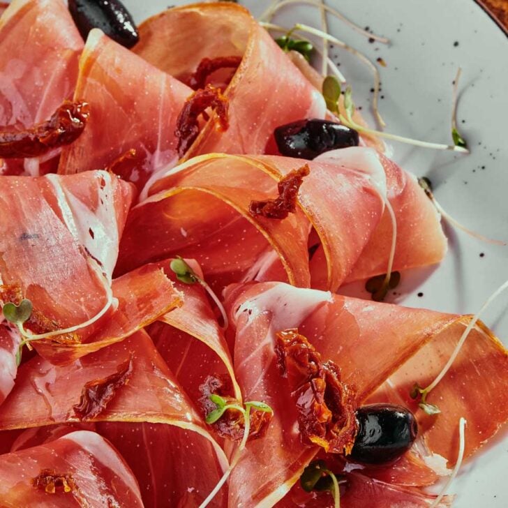 A-meat-plate-with-olives-eaten-on-a-food-tour-in Marseille France