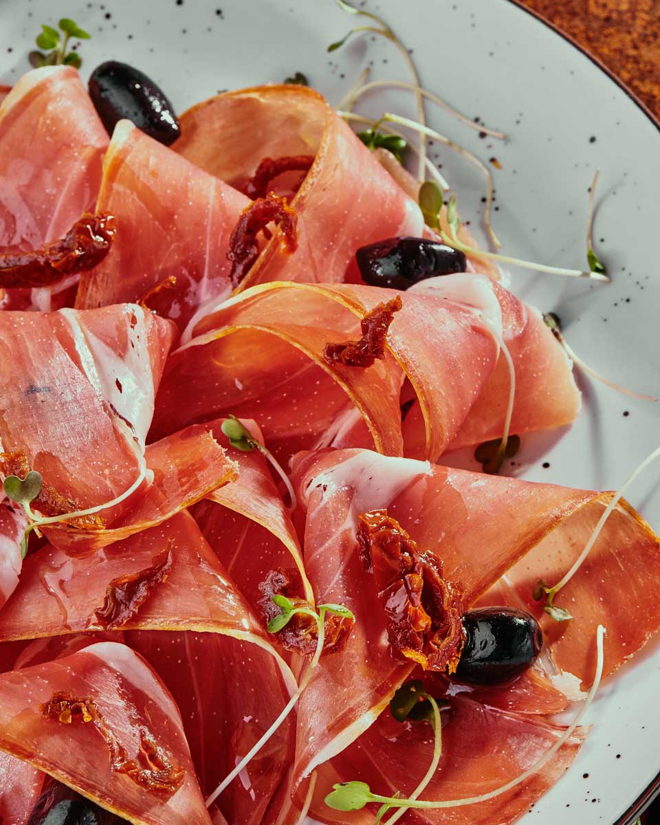 A-meat-plate-with-olives-eaten-on-a-food-tour-in Marseille France