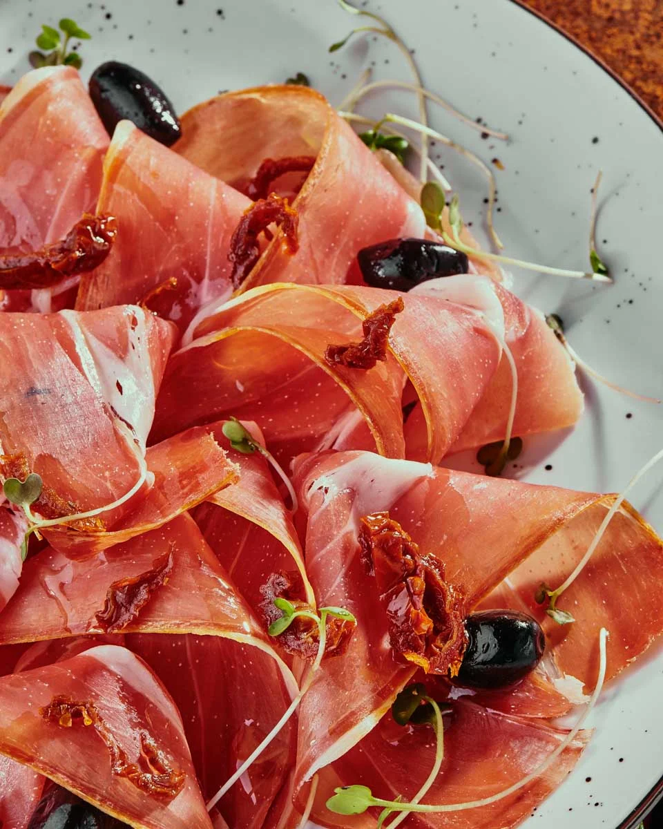 A-meat-plate-with-olives-eaten-on-a-food-tour-in Marseille France