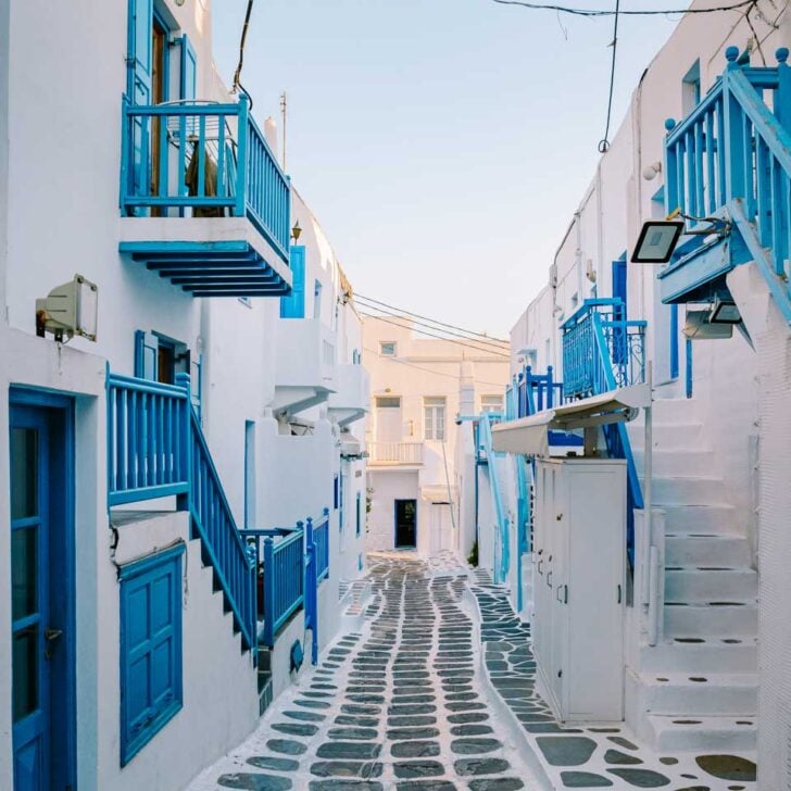 A white and blue street in Little Venice seen on a tour in Mykonos Greece