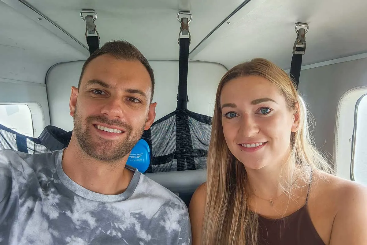 Bailey-and-Daniel-take-a-selfie-on-a-sea-plane-in-Kauai Hawaii