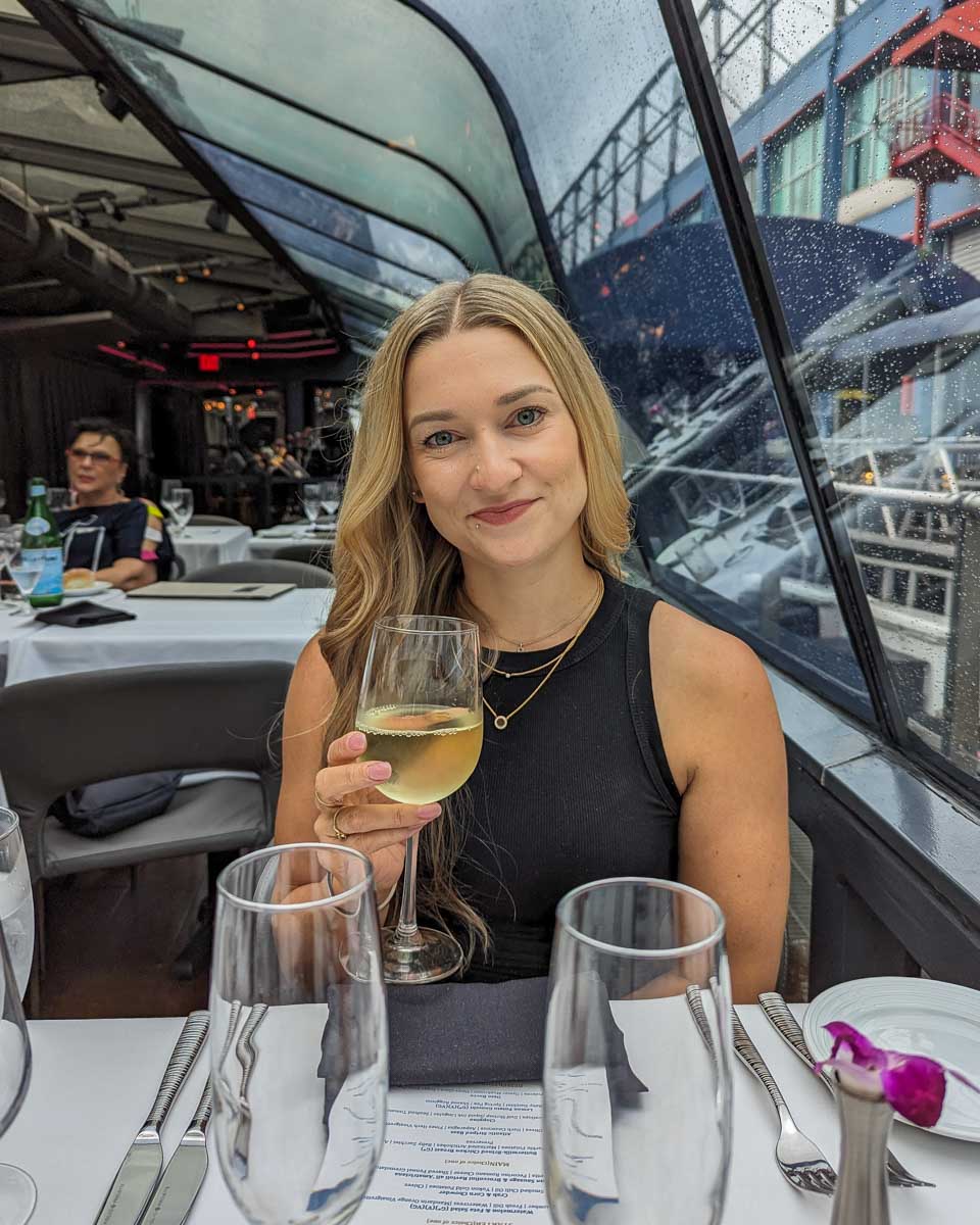Bailey with a glass of wine on a Seine River cruise in Paris France