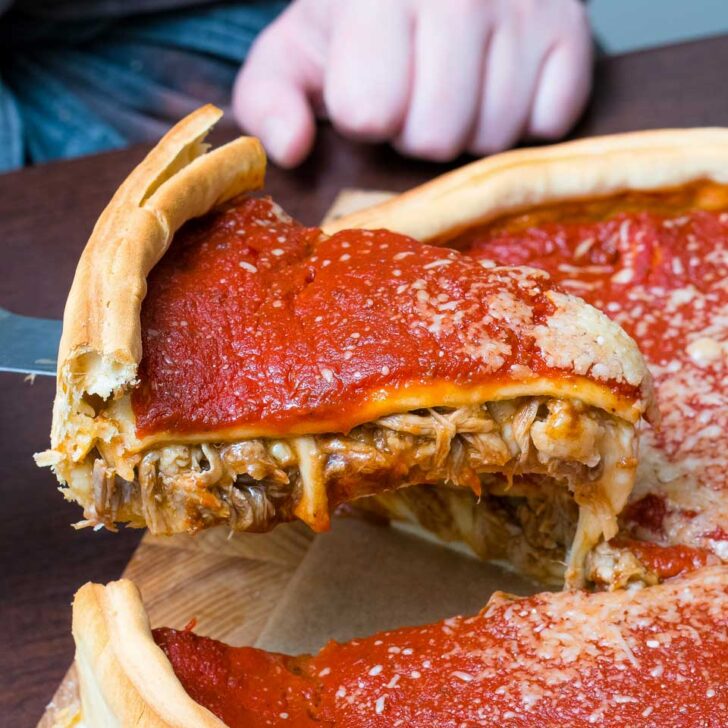 A slice of Chicago pizza eaten on a tour in Chicago Illinois 1