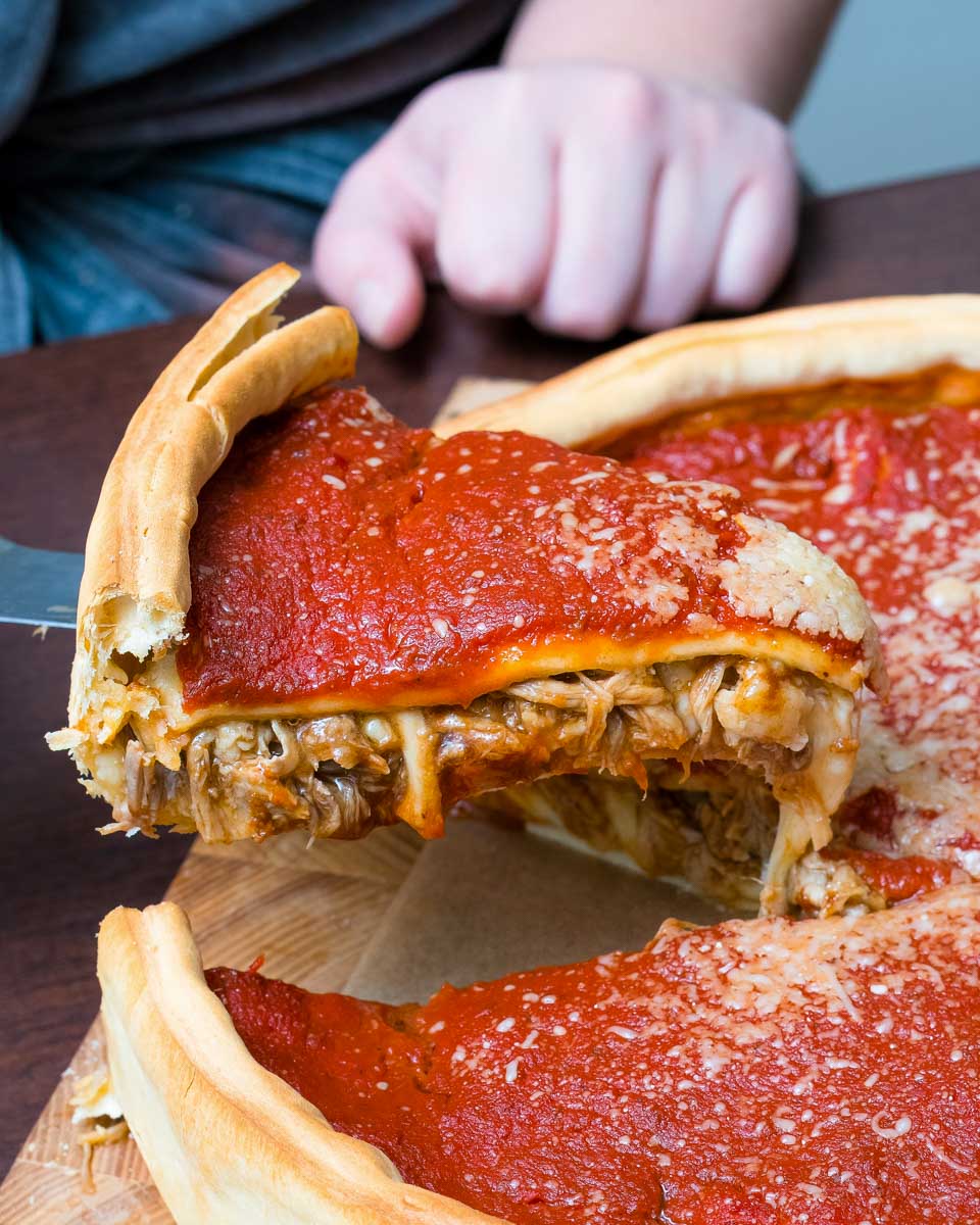 A slice of Chicago pizza eaten on a tour in Chicago Illinois 1