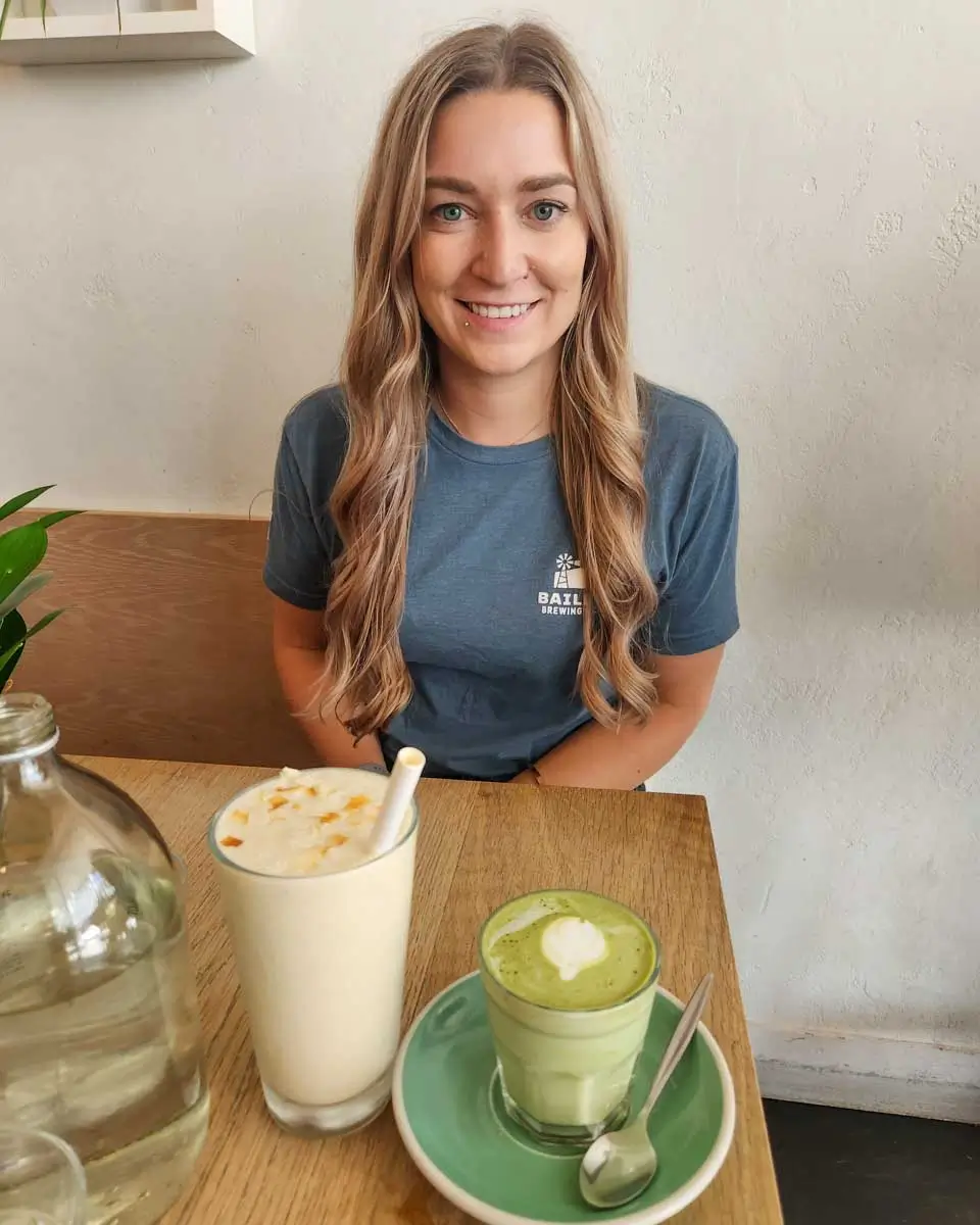 Bailey-drinks-matcha-and-a-smoothie in Dallas, Texas
