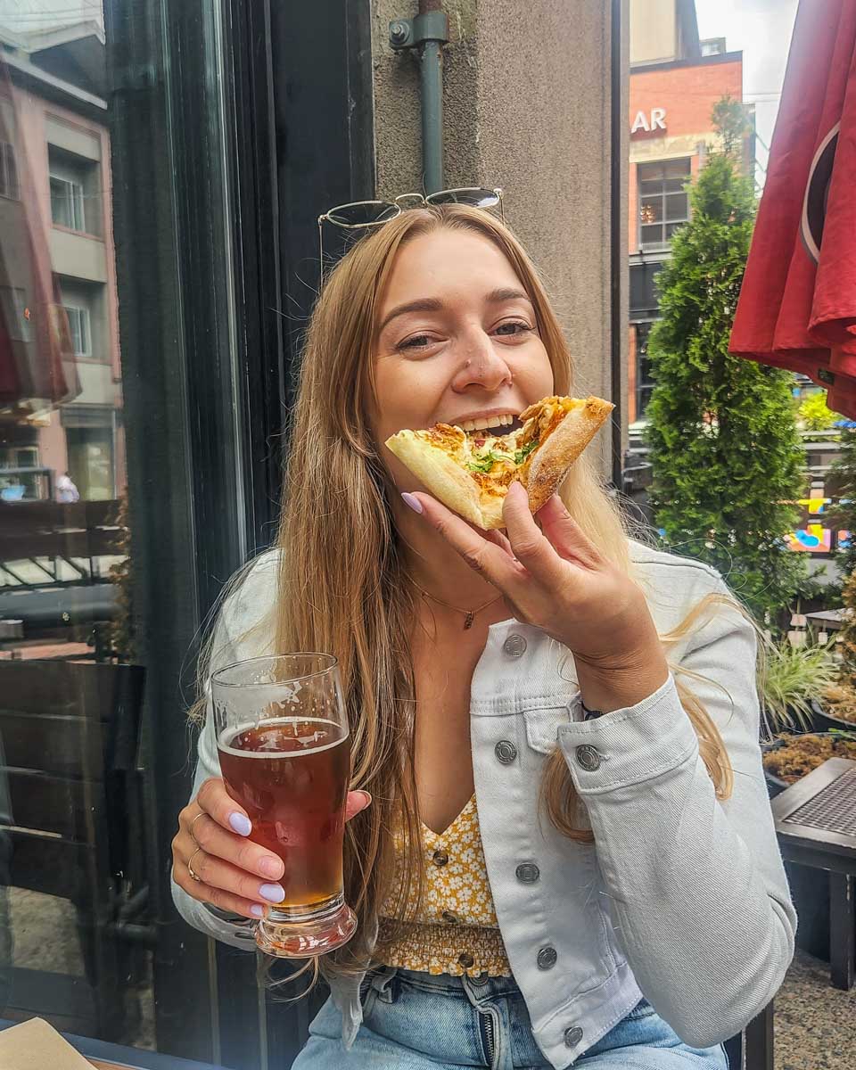 Bailey-eats-pizza-and-drinks-beer-in San Antonio Texas