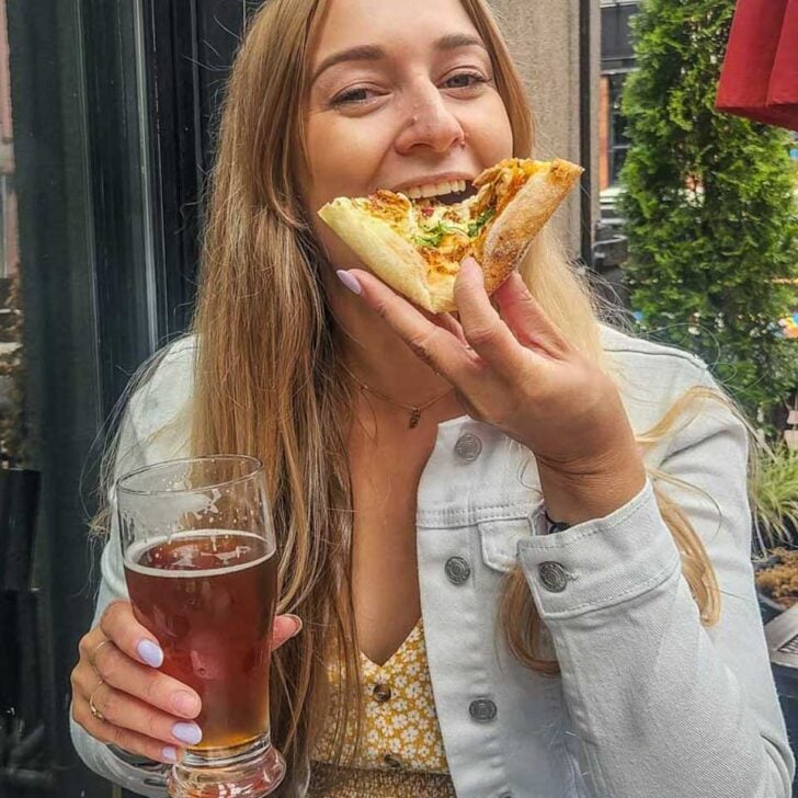 Bailey-eats-pizza-on-a-food-tour-in-Houston Texas