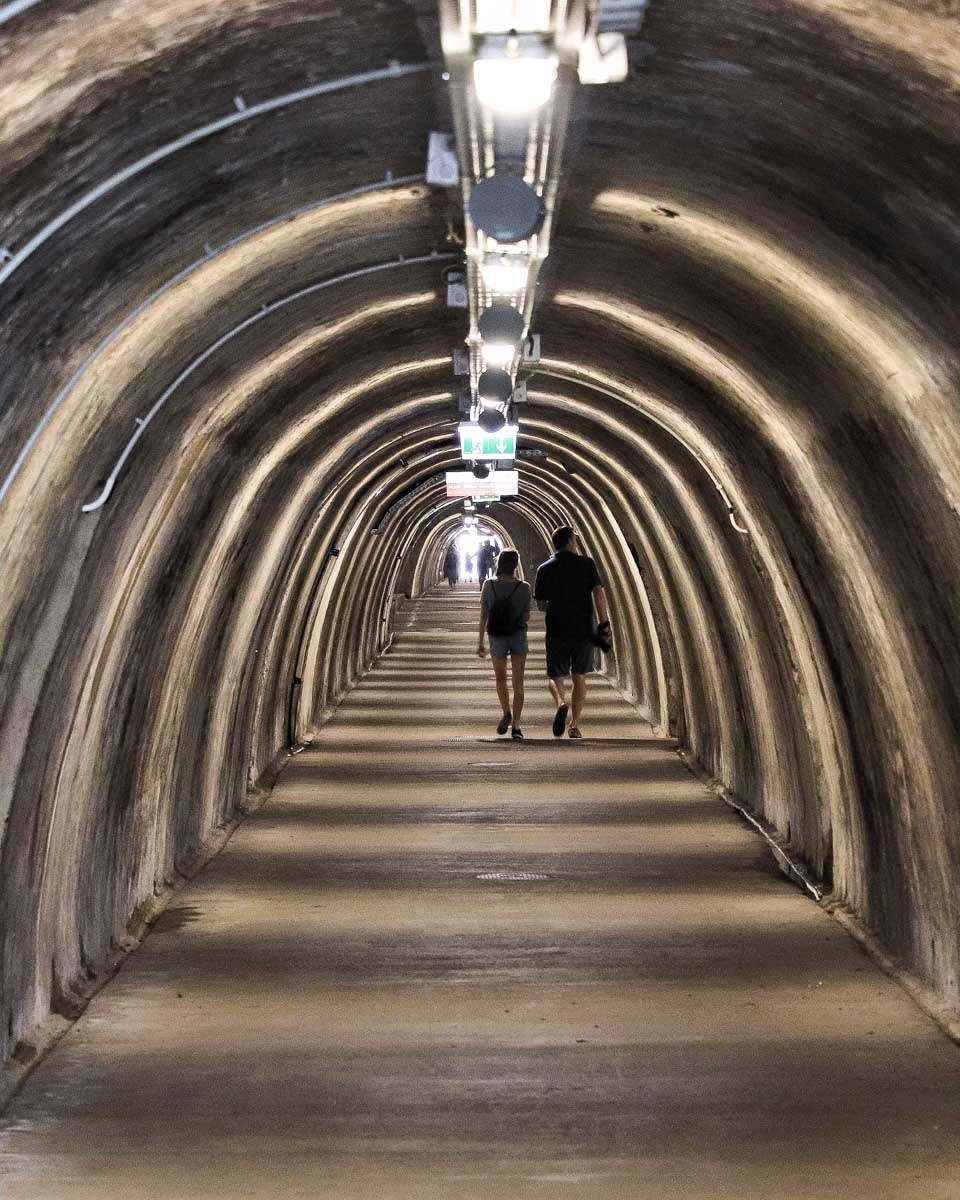 People walk down tunnel gric in Zagreb Croatia