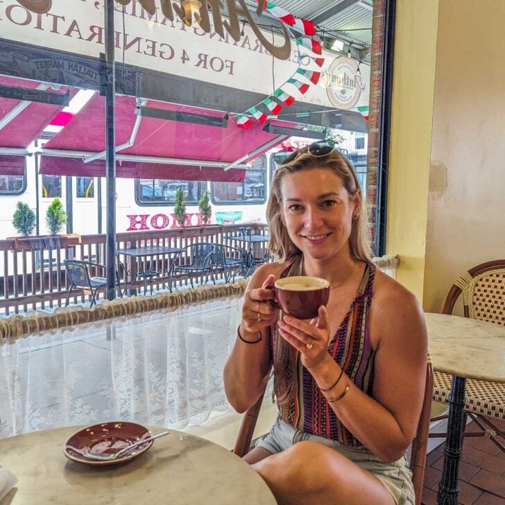 Bailey drinks coffee on a coffee tour in Seattle Washington