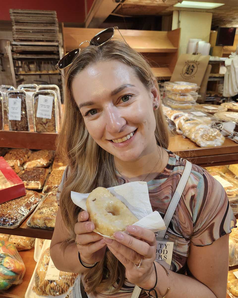 Bailey-eating-a-pastry-in-Barcelona-Spain