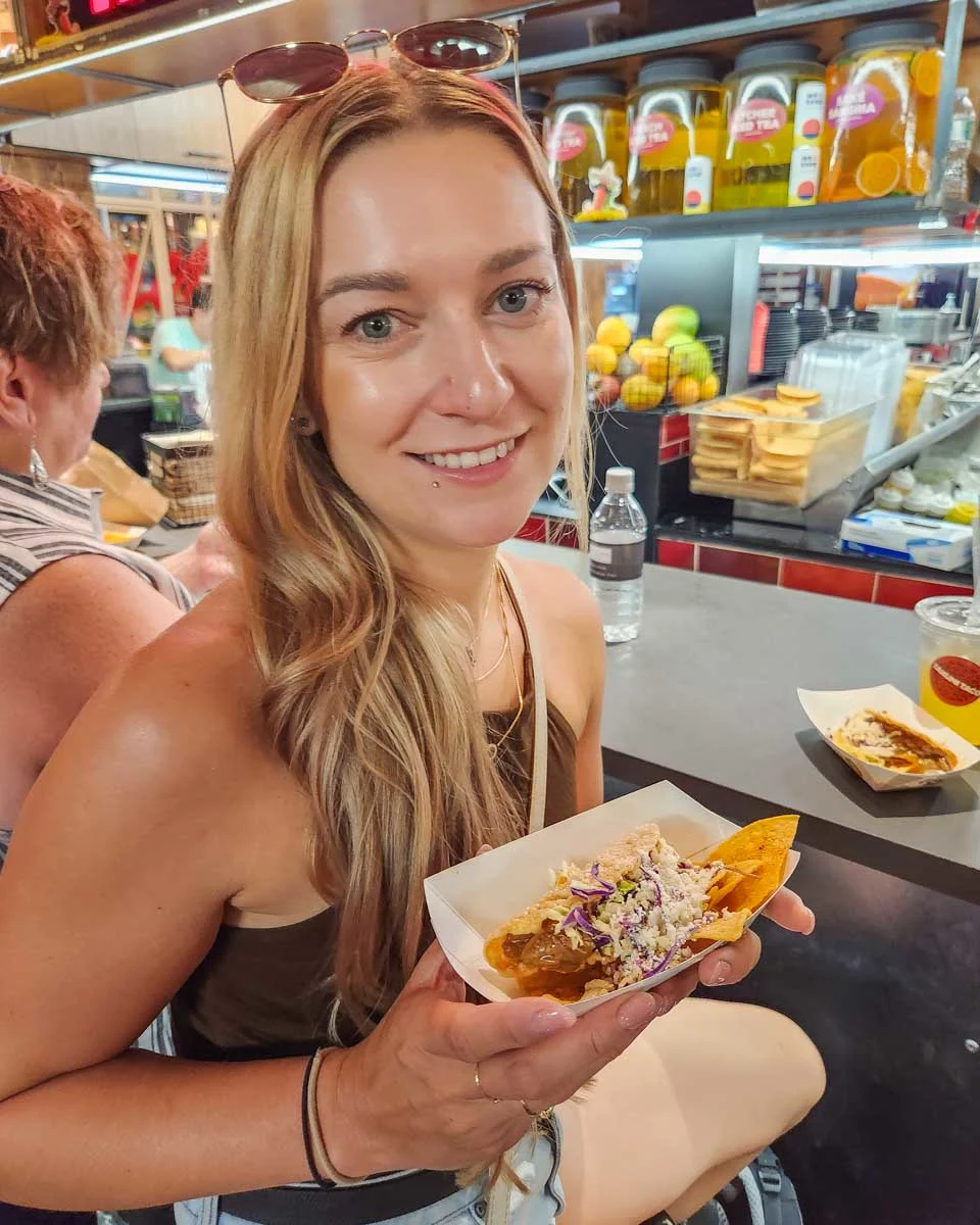 Bailey-eats-food-on-a-food-tour-in-Charleston South Carolina