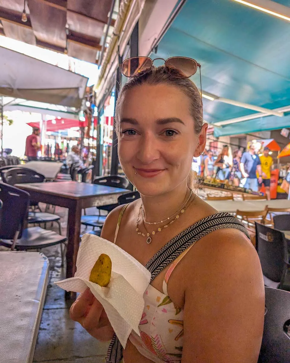 Bailey-holds-street food in Madrid Spain