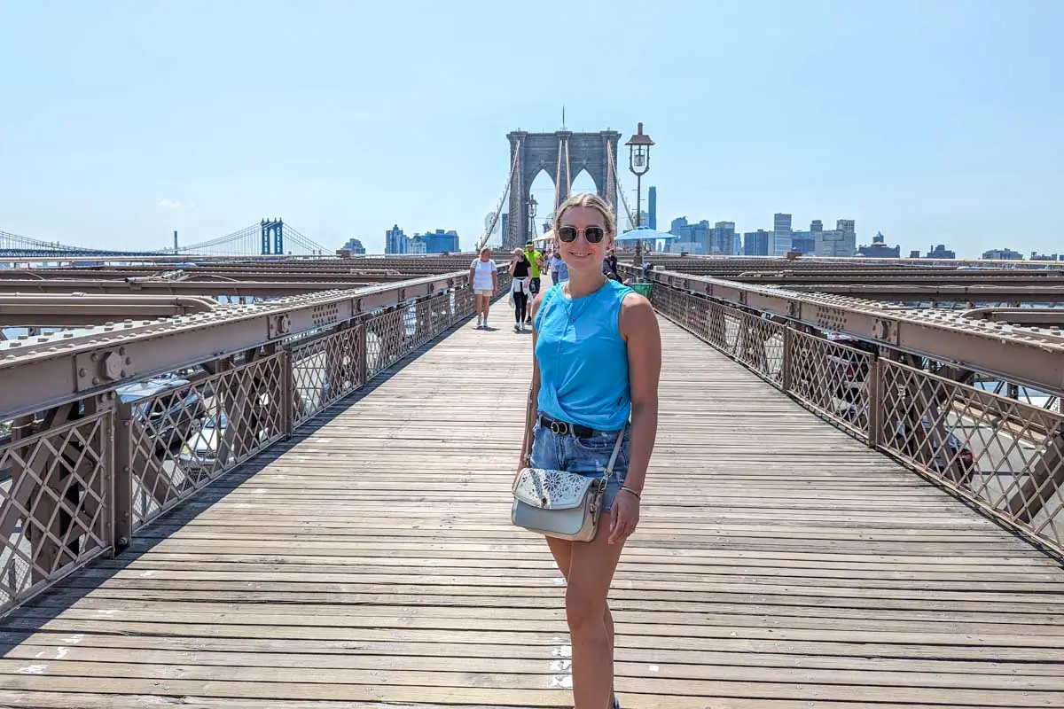 Bailey smiles on the Brooklyn Bridge in Lower Manhattan, New York City, New York (2)