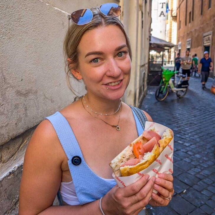 Bailey-with-a-sandwich-on a food tour in Nice France