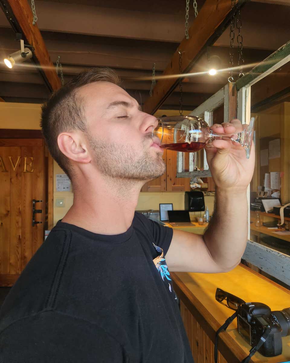 Dan-tastes-wine-at-a-winery-on-a-tour-in-Bari Italy