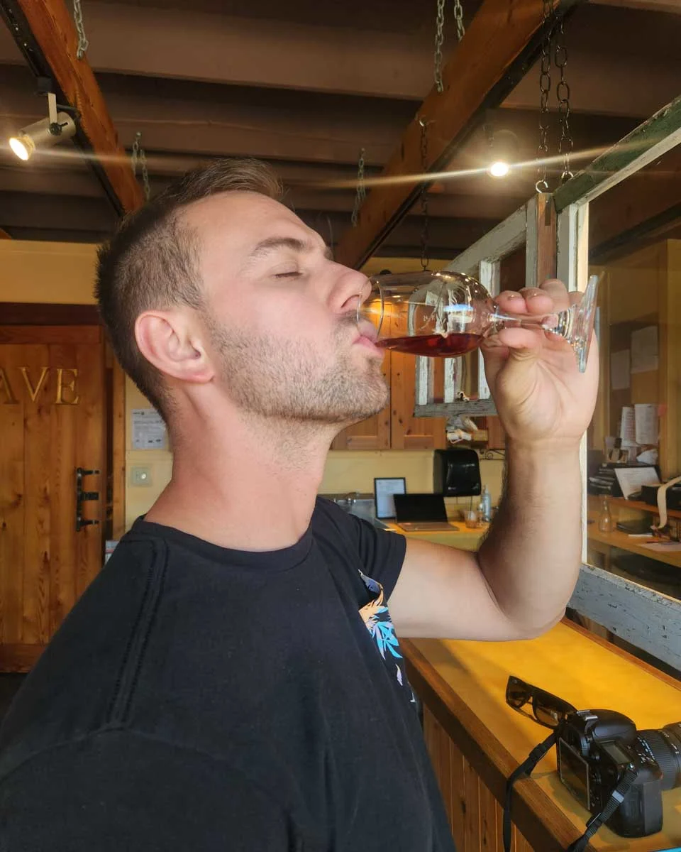 Dan-tastes-wine-at-a-winery-on-a-tour-in-Bari Italy