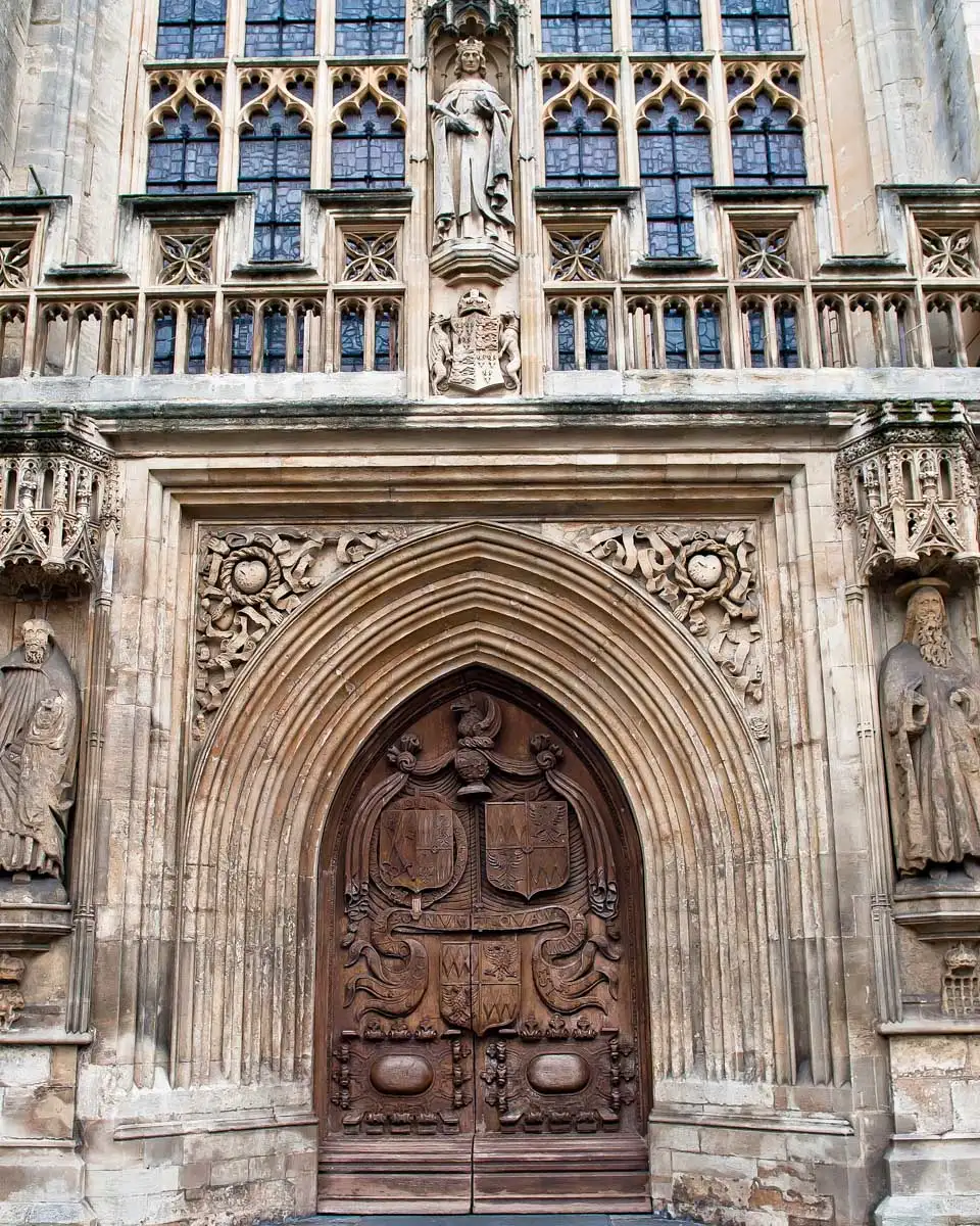 A door to Bath Abbey seen on a tour to Windsor Castle from London England