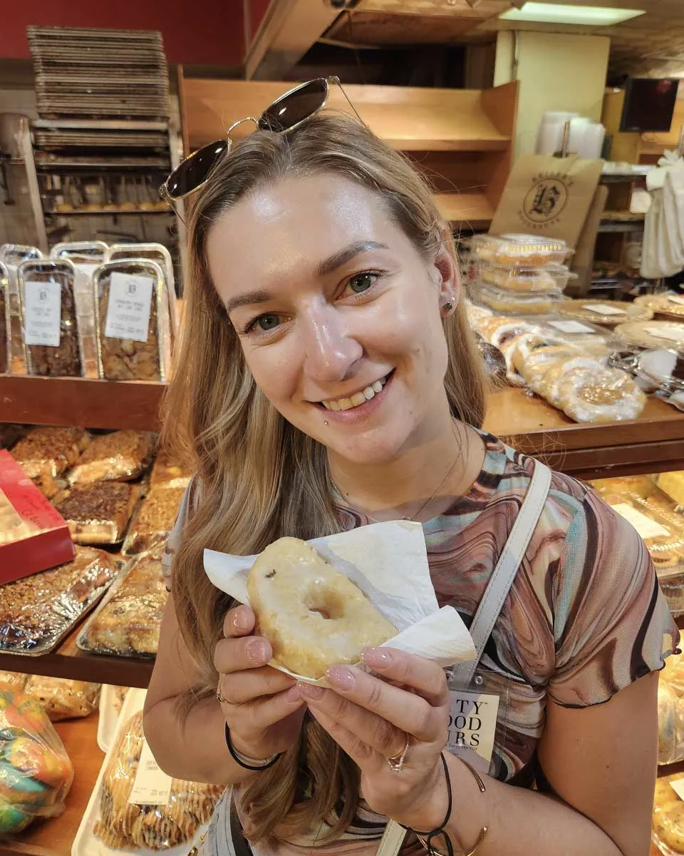 Bailey-eating-a-donut-on-a-tour-in-Cork Ireland