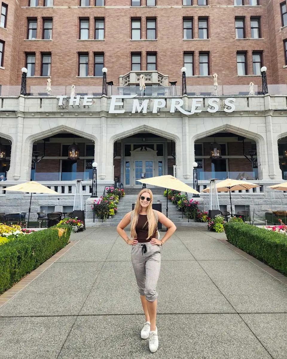 Bailey posing outside the Empress Hotel in Victoria, BC