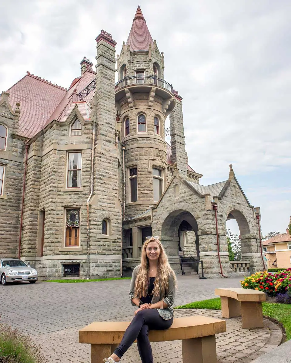 Bailey sitting outside the Craigdarroch Castle in Victoria BC