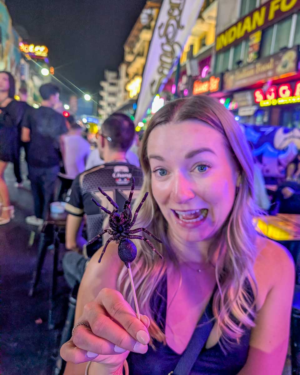 Bailey with a scorpion on a stick in Khao San Bangkok Thailand (17)