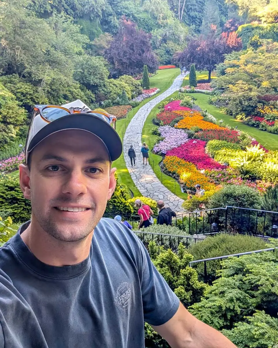 Daniel taking a selfie at The Butchart Gardens in Victoria BC
