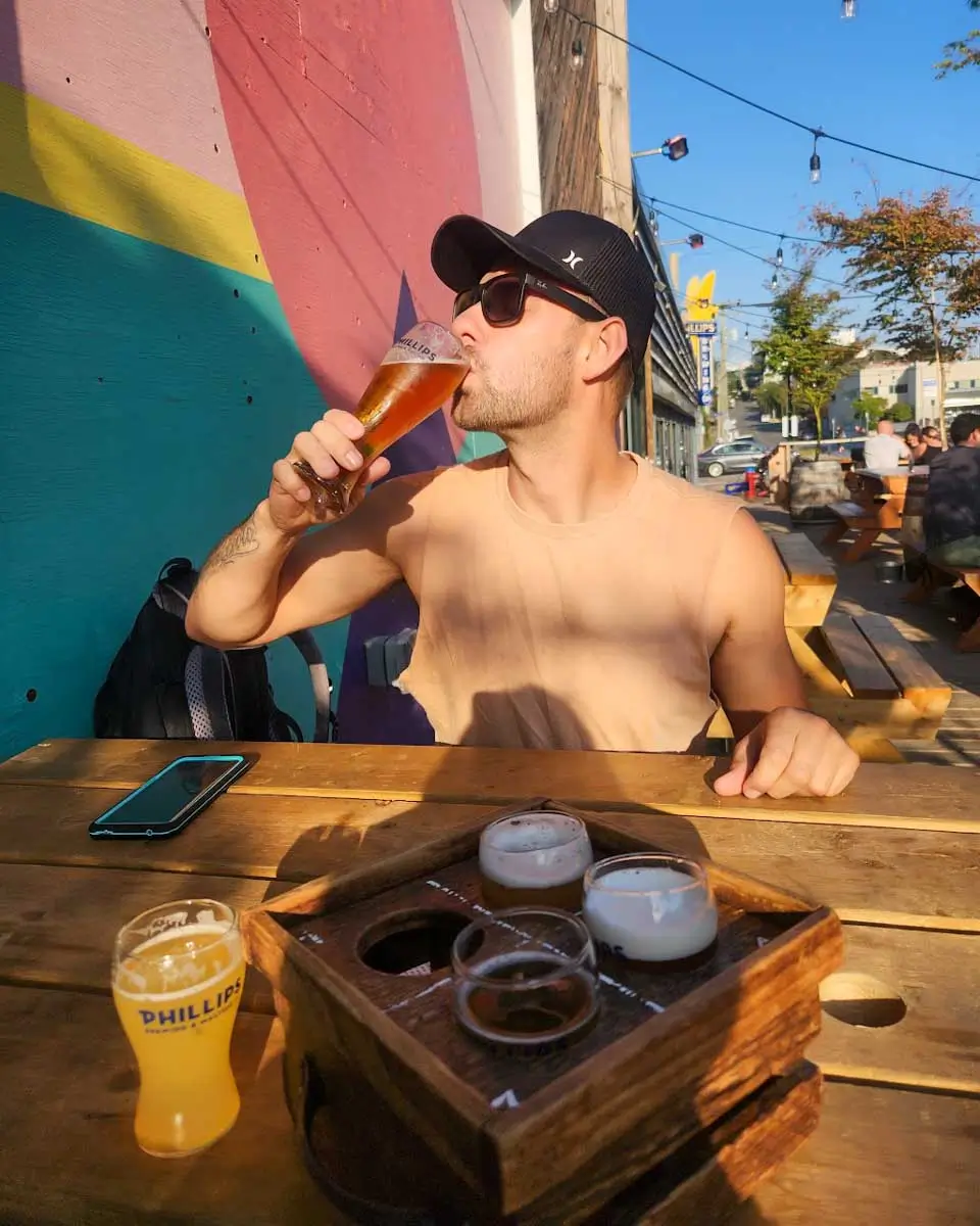 Daniel drinking beer at the Phillips Brewery in Victoria BC