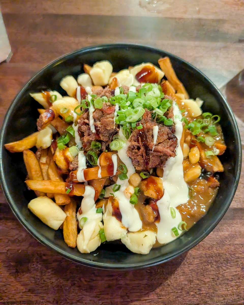 Poutine eaten on a food tour in Quebec City, Canada