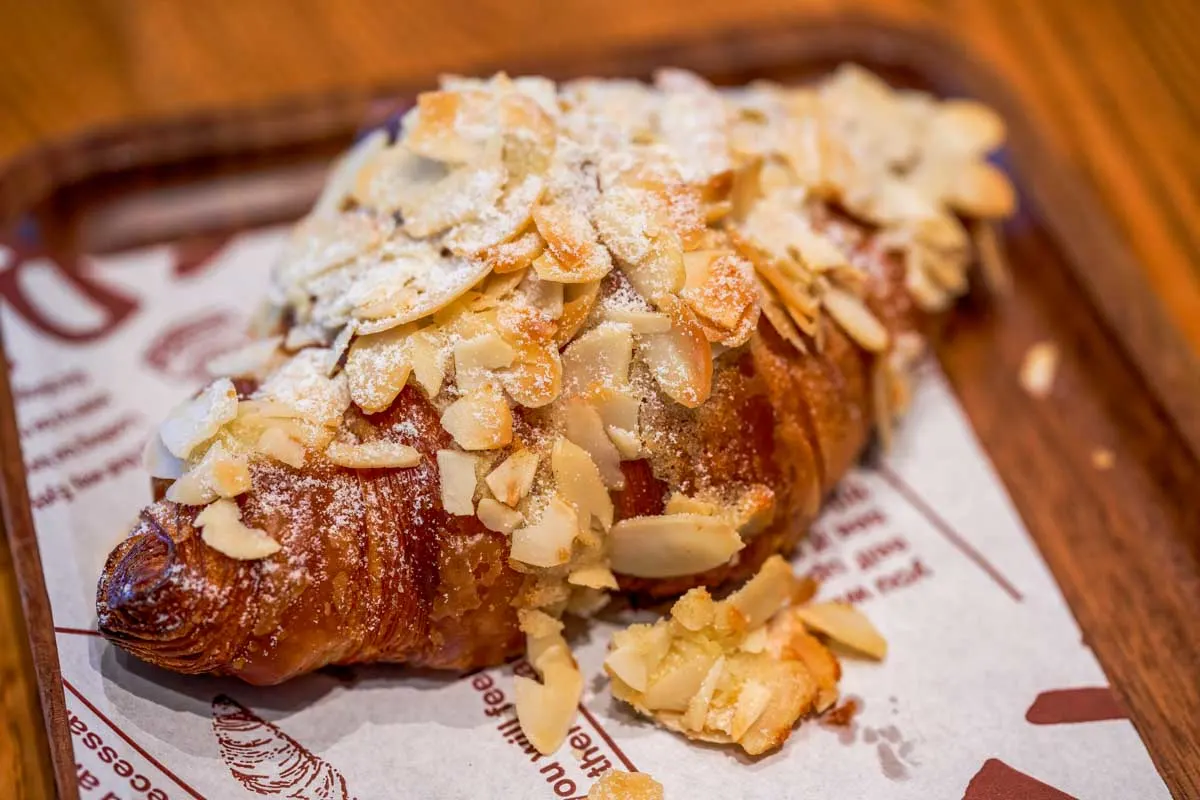 An-almond-croissant-eaten-for-breakfast-in-Salt Lake City Utah