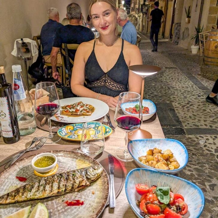 Bailey-eats-dinner-with-wine-in-Bari Italy