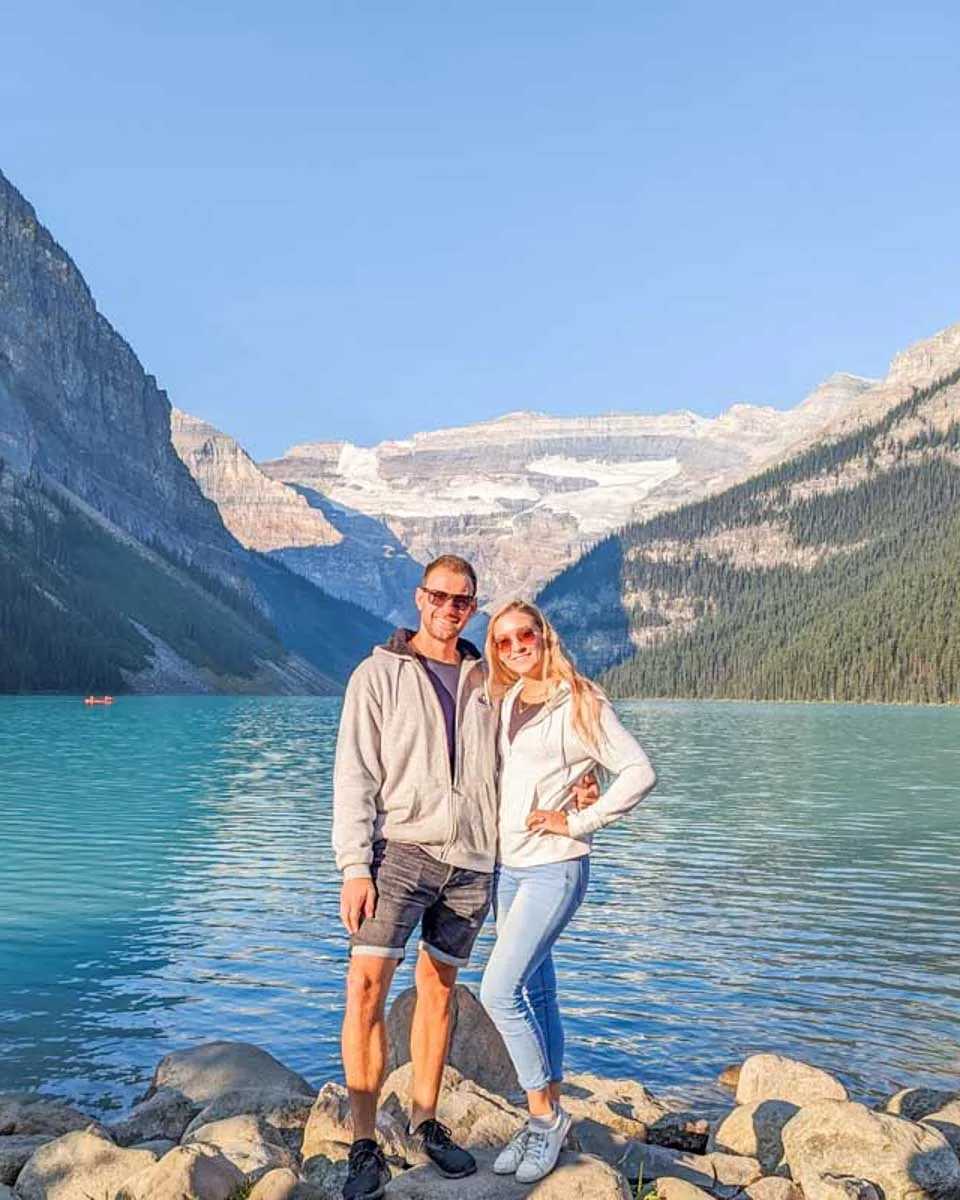 Daniel-and-Bailey-pose-for-a-photo-at-Lake-Louise on a tour from Calgary Alberta