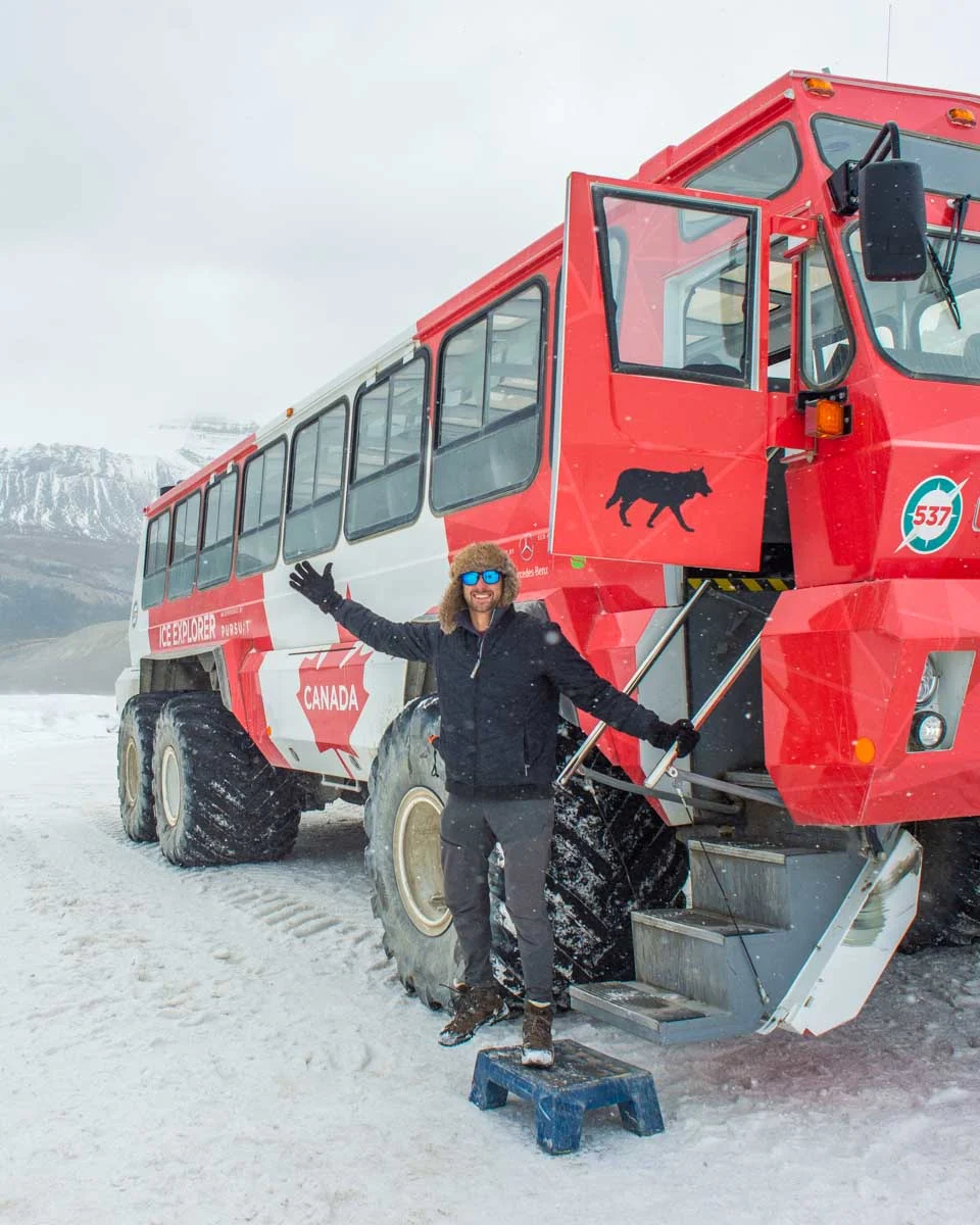 Daniel-on-one-of-the-large-Ice-Explorers-on-the-Athabasca-Glacier-on-a-tour-from-Calgary Alberta