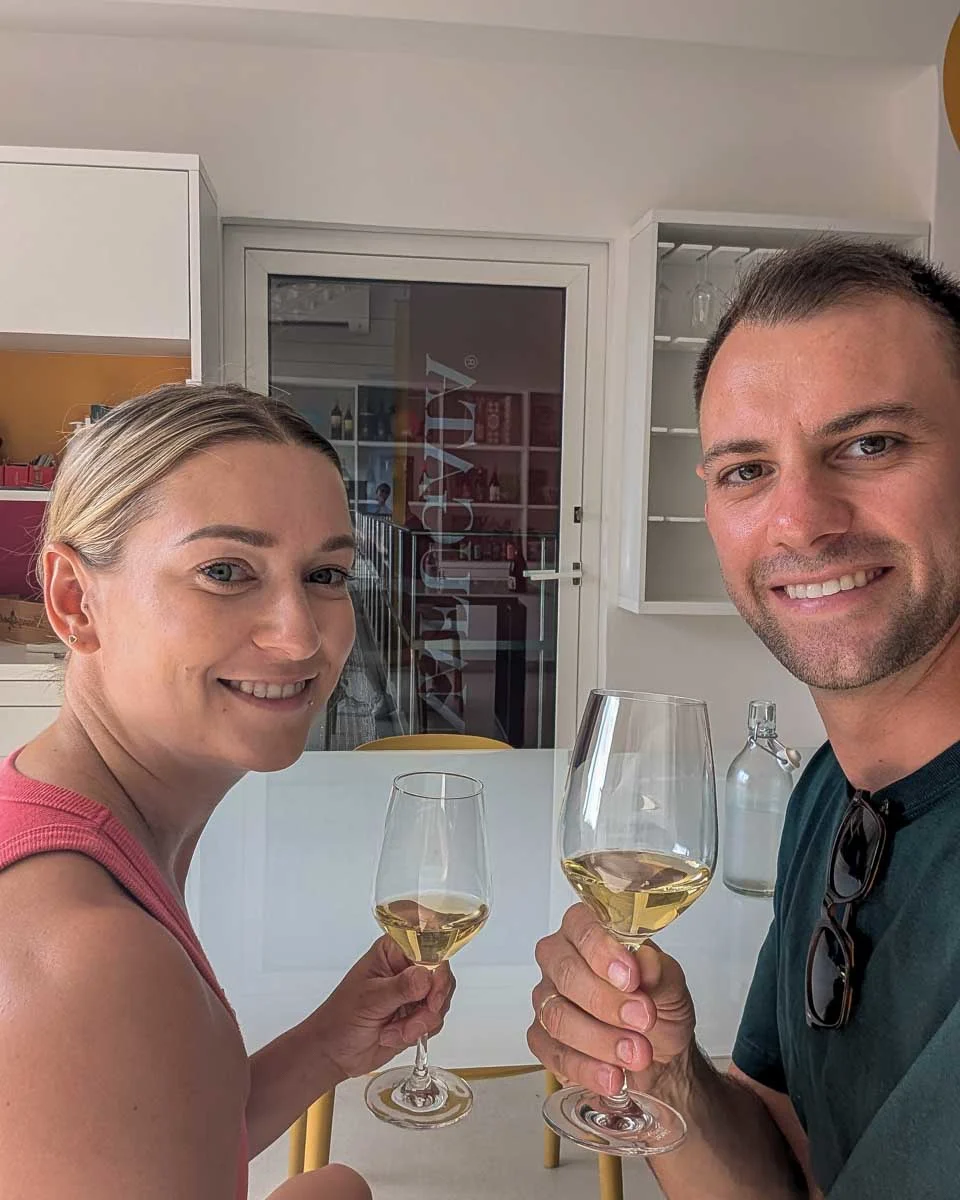 Bailey-and-Daniel-drink champagne on a tour in France