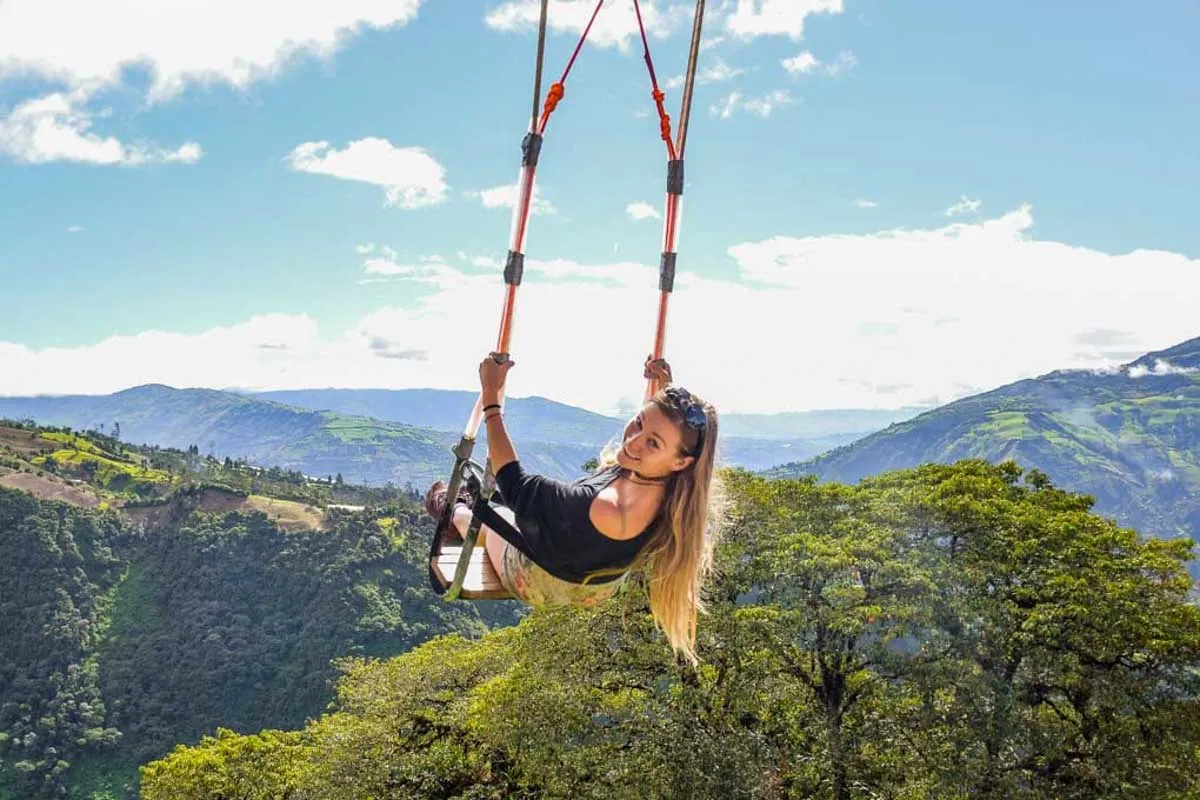 Bailey on the swing at the end of the world in Ecuador